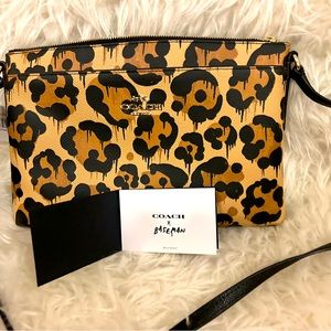 Coach x Baseman Wild Beast collection. New with tags, never been used.